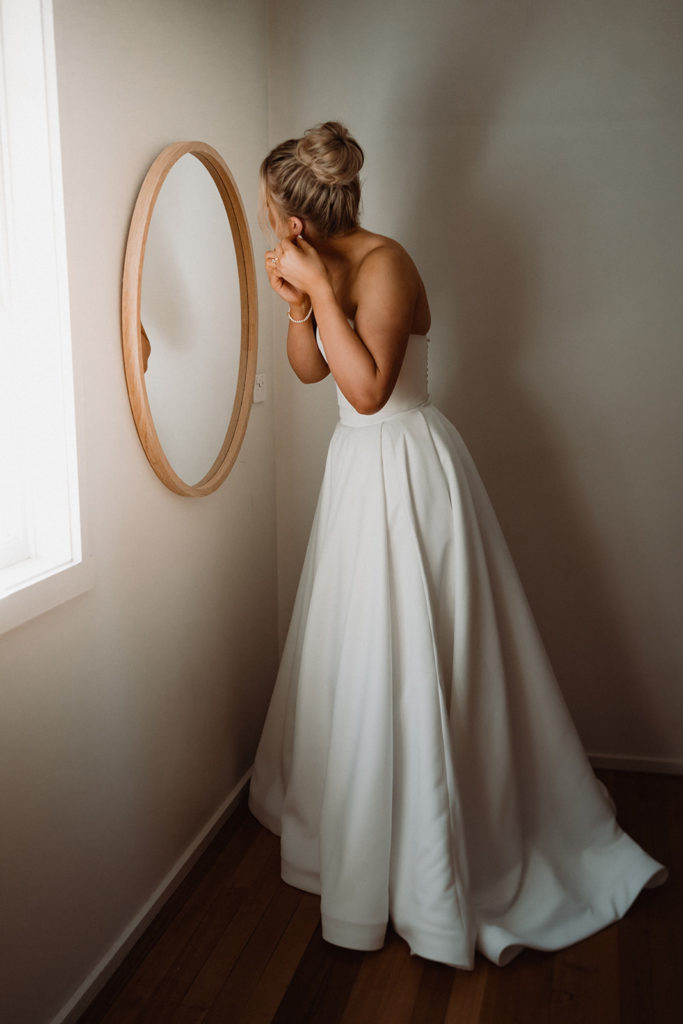 cinematic wedding photo or bride getting ready